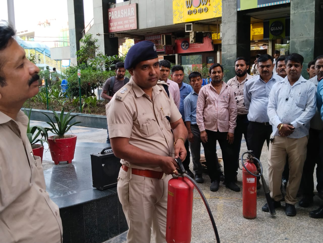 A fire Officer giving training on Fore Extinguisher