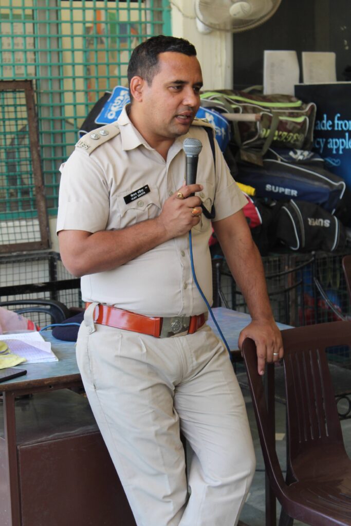 a Fire Officer giving answers on Fire Safety FAQ in a School